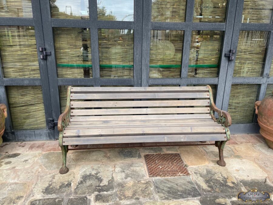Beautiful bench with cast iron base and wooden slats